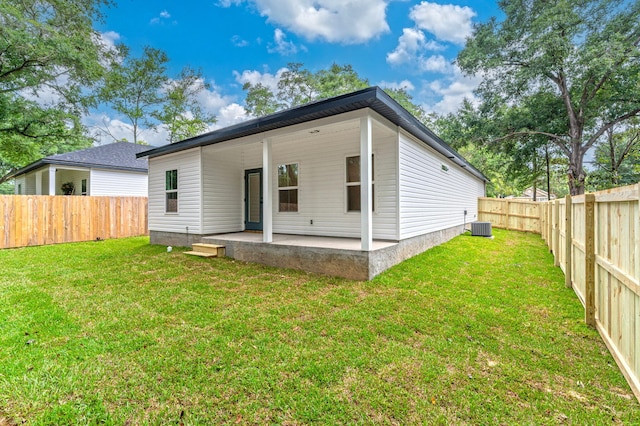 2940 Mccarty Ave, Crestview, FL 32539 - back of house with a fenced backyard and a patio area