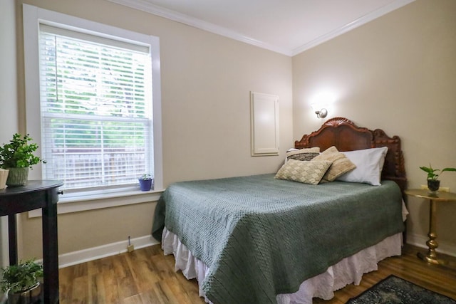 161 Caswell Branch Rd, Freeport, FL 32439 - bedroom with wood finished floors, ornamental molding, and multiple windows