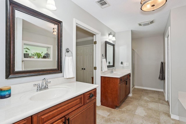 107 Shell Dr, Crestview, FL 32536 - full bathroom with two vanities and a shower