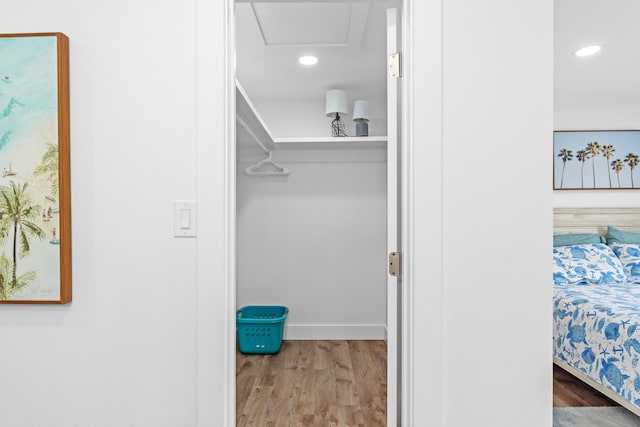 431 Linkside Cir, Miramar Beach, FL 32550 - walk in closet featuring wood finished floors