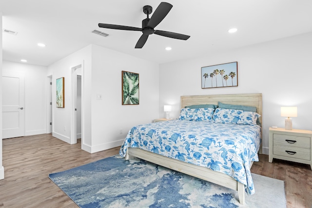 431 Linkside Cir, Miramar Beach, FL 32550 - bedroom with wood finished floors, recessed lighting, and ceiling fan