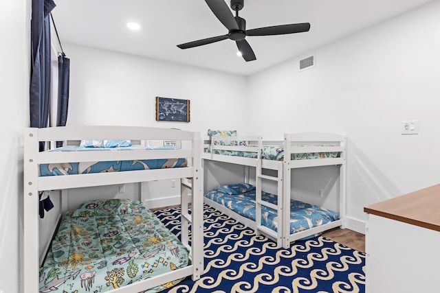 431 Linkside Cir, Miramar Beach, FL 32550 - bedroom with recessed lighting, a ceiling fan, and wood finished floors