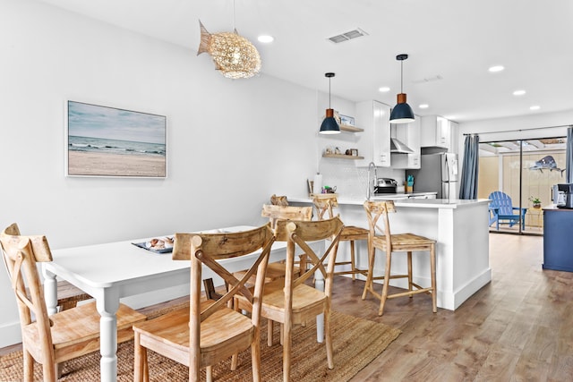 431 Linkside Cir, Miramar Beach, FL 32550 - dining area with light wood-type flooring and recessed lighting