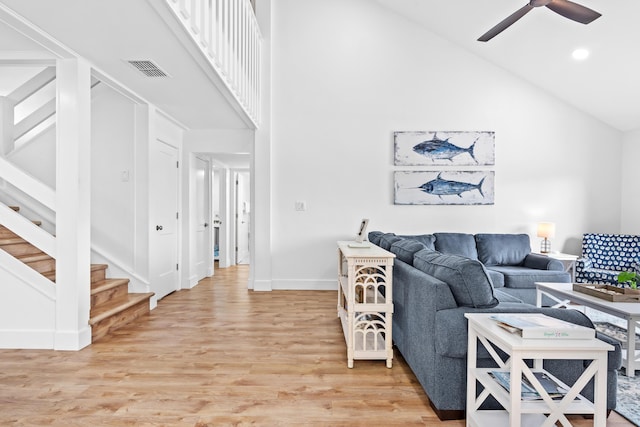 431 Linkside Cir, Miramar Beach, FL 32550 - living area featuring high vaulted ceiling, stairs, light wood finished floors, ceiling fan, and recessed lighting
