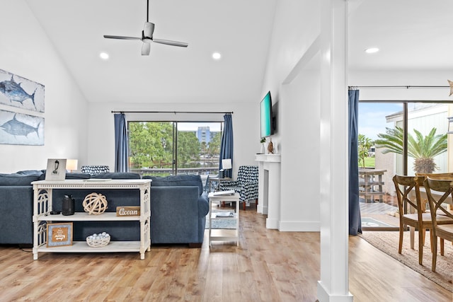 431 Linkside Cir, Miramar Beach, FL 32550 - living area with plenty of natural light, a ceiling fan, recessed lighting, wood finished floors, and high vaulted ceiling