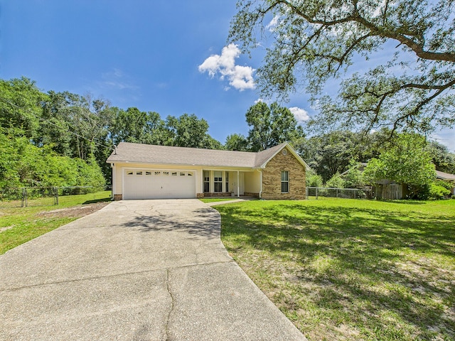 422 John King Rd, Crestview, FL 32539 - ranch-style home featuring a garage and concrete driveway