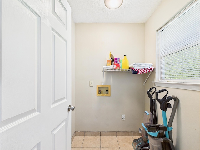 422 John King Rd, Crestview, FL 32539 - laundry room with washer hookup, light tile patterned floors, and a textured ceiling
