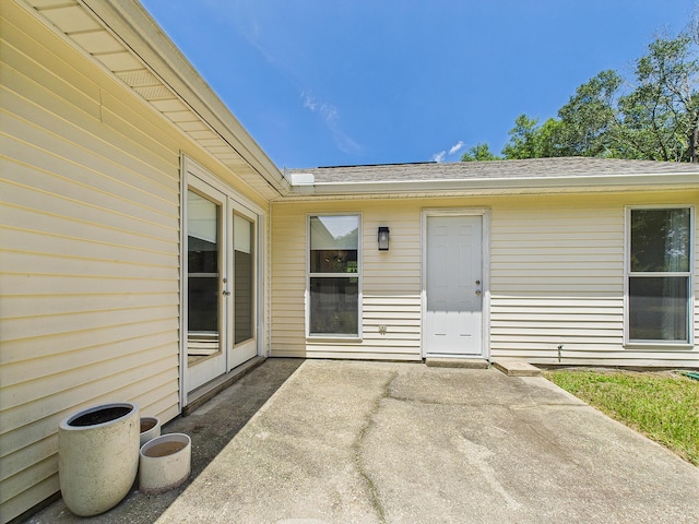 422 John King Rd, Crestview, FL 32539 - entrance to property featuring a patio area and a shingled roof