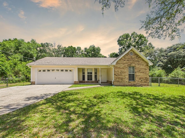 422 John King Rd, Crestview, FL 32539 - single story home featuring concrete driveway, an attached garage, and brick siding
