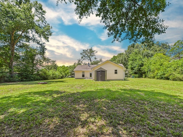 422 John King Rd, Crestview, FL 32539 - view of green lawn with an outdoor structure