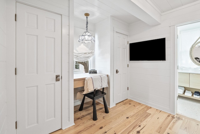 54 Roberts Way, Santa Rosa Beach, FL 32459 - bedroom featuring light wood-type flooring, a chandelier, and ornamental molding