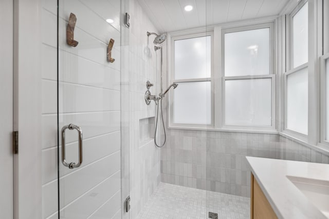 54 Roberts Way, Santa Rosa Beach, FL 32459 - full bath with a stall shower, recessed lighting, vanity, and tile walls