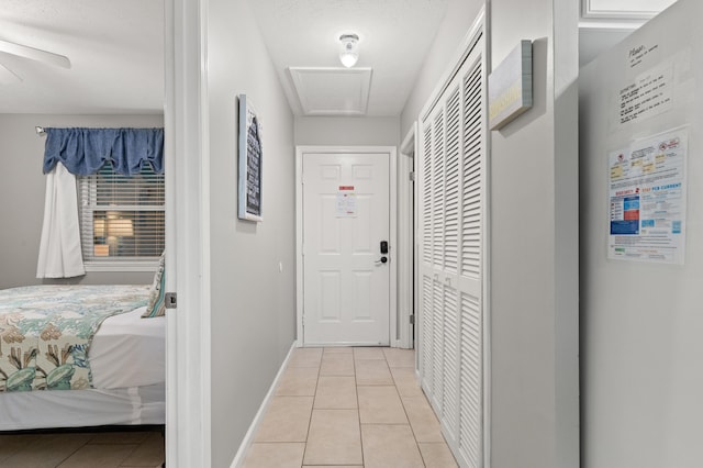 134 Damon Cir Unit Q, Panama City Beach, FL 32407 - corridor with light tile patterned flooring and water heater