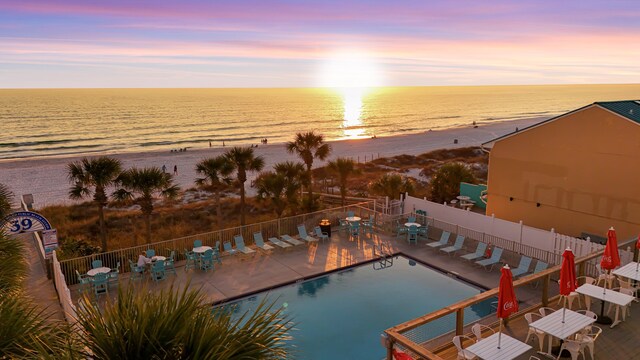 134 Damon Cir Unit Q, Panama City Beach, FL 32407 - community pool with view of water and beach and a patio