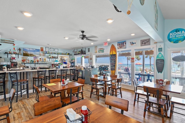 134 Damon Cir Unit Q, Panama City Beach, FL 32407 - dining room with a ceiling fan, wood finished floors, and recessed lighting
