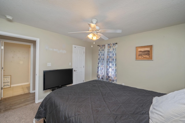 80 Azalea Trce, Defuniak Springs, FL 32433 - bedroom featuring a ceiling fan and a textured ceiling