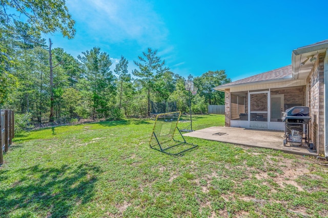 80 Azalea Trce, Defuniak Springs, FL 32433 - fenced backyard featuring a sunroom and a patio