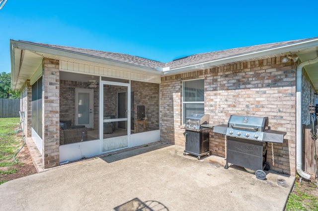 80 Azalea Trce, Defuniak Springs, FL 32433 - view of patio with a sunroom and grilling area
