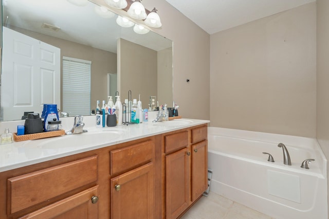 80 Azalea Trce, Defuniak Springs, FL 32433 - full bathroom with double vanity, a bath, tile patterned floors, and a chandelier