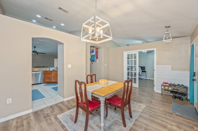 80 Azalea Trce, Defuniak Springs, FL 32433 - dining space with arched walkways, light wood finished floors, ceiling fan, a chandelier, and recessed lighting
