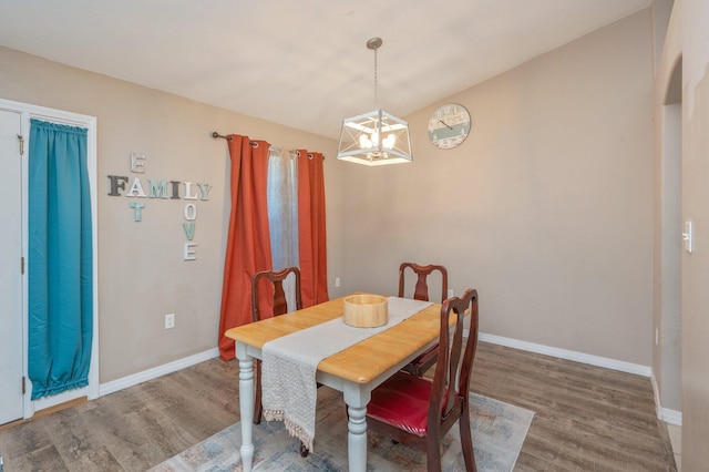 80 Azalea Trce, Defuniak Springs, FL 32433 - dining space featuring a chandelier and wood finished floors