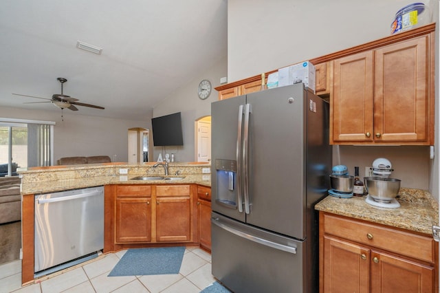 80 Azalea Trce, Defuniak Springs, FL 32433 - kitchen featuring stainless steel appliances, arched walkways, open floor plan, light tile patterned floors, and ceiling fan