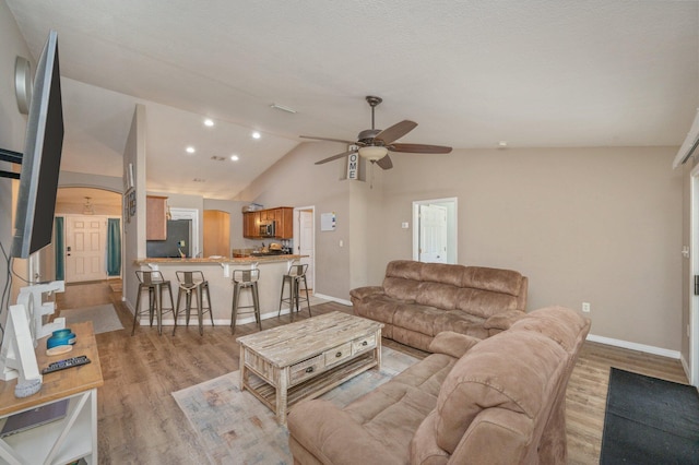 80 Azalea Trce, Defuniak Springs, FL 32433 - living area with vaulted ceiling, light wood-type flooring, and ceiling fan