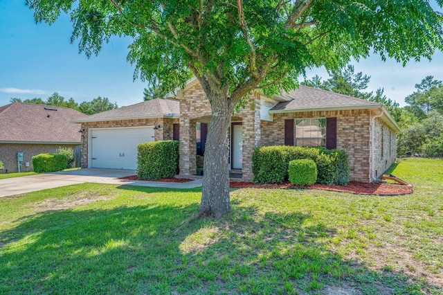 80 Azalea Trce, Defuniak Springs, FL 32433 - view of front of property featuring concrete driveway, a garage, a front yard, brick siding, and a shingled roof
