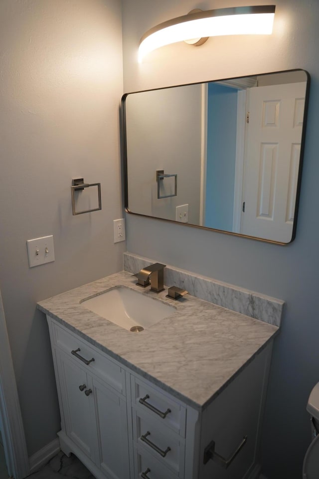1198 Saddle Creek Dr, Fort Walton Beach, FL 32547 - bathroom featuring vanity and marble finish flooring