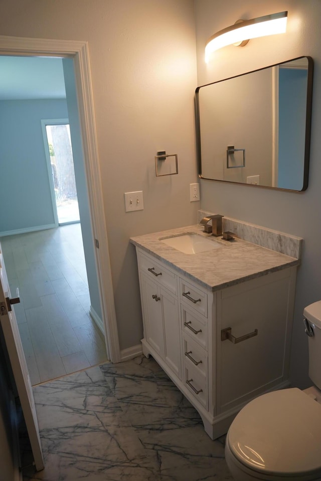 1198 Saddle Creek Dr, Fort Walton Beach, FL 32547 - bathroom featuring vanity and marble look tiles