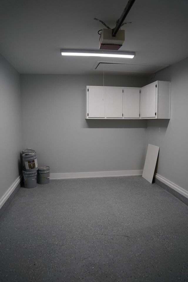 1198 Saddle Creek Dr, Fort Walton Beach, FL 32547 - garage featuring a garage door opener and baseboards