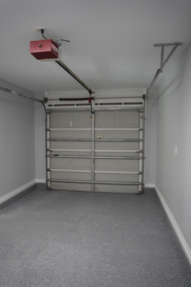 1198 Saddle Creek Dr, Fort Walton Beach, FL 32547 - garage with a garage door opener and baseboards