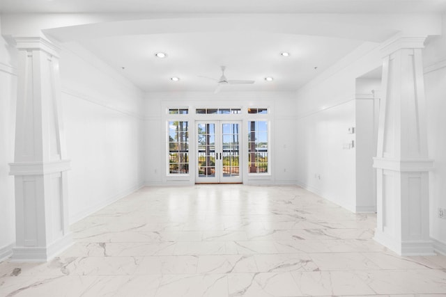 1101 Sawgrass Ct Unit 102, Panama City Beach, FL 32413 - empty room featuring french doors, ceiling fan, light marble finish flooring, decorative columns, and recessed lighting