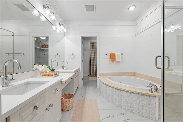 1101 Sawgrass Ct Unit 102, Panama City Beach, FL 32413 - full bath with marble look tiles, a stall shower, double vanity, a garden tub, and recessed lighting