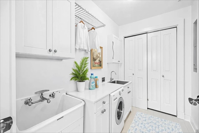 1101 Sawgrass Ct Unit 102, Panama City Beach, FL 32413 - laundry area featuring washer / dryer and cabinet space
