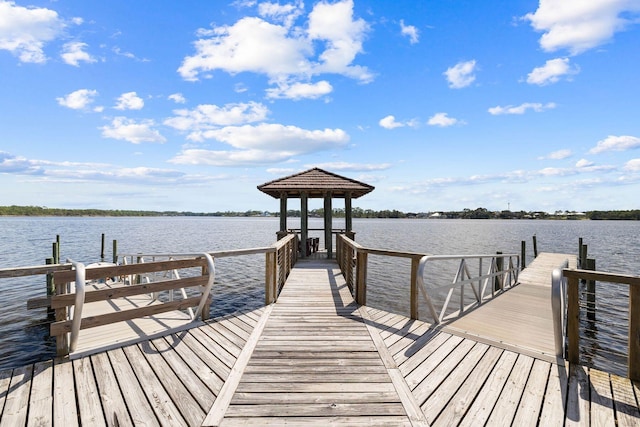 1101 Sawgrass Ct Unit 102, Panama City Beach, FL 32413 - dock area with a water view and a gazebo