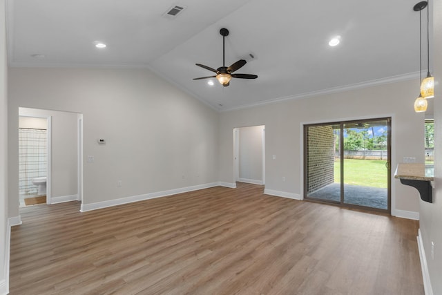 7478 Brevard St, Navarre, FL 32566 - empty room with a ceiling fan, ornamental molding, light wood-style flooring, lofted ceiling, and recessed lighting