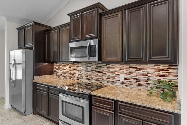 7478 Brevard St, Navarre, FL 32566 - kitchen featuring appliances with stainless steel finishes, ornamental molding, backsplash, dark brown cabinetry, and light stone counters