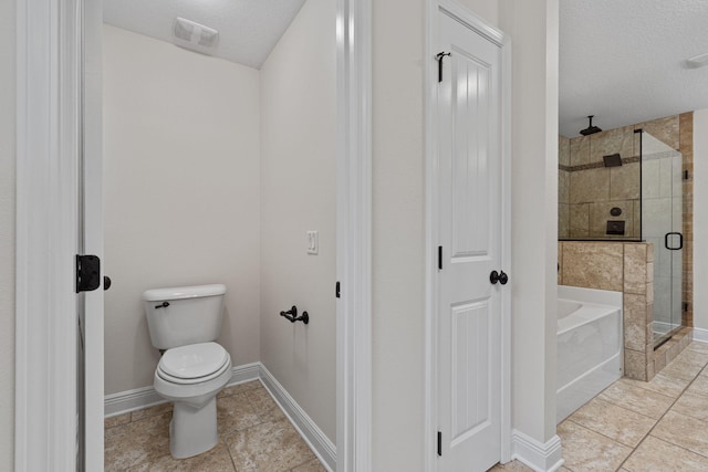 7478 Brevard St, Navarre, FL 32566 - bathroom featuring a shower stall, a bath, tile patterned floors, and a textured ceiling
