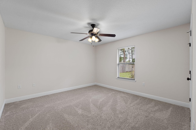 7478 Brevard St, Navarre, FL 32566 - empty room featuring carpet flooring and ceiling fan