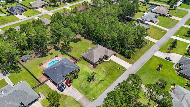 7478 Brevard St, Navarre, FL 32566 - aerial view of residential area featuring a pool area