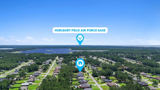7478 Brevard St, Navarre, FL 32566 - aerial view of residential area with a heavily wooded area