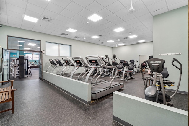 7478 Brevard St, Navarre, FL 32566 - workout area featuring a paneled ceiling