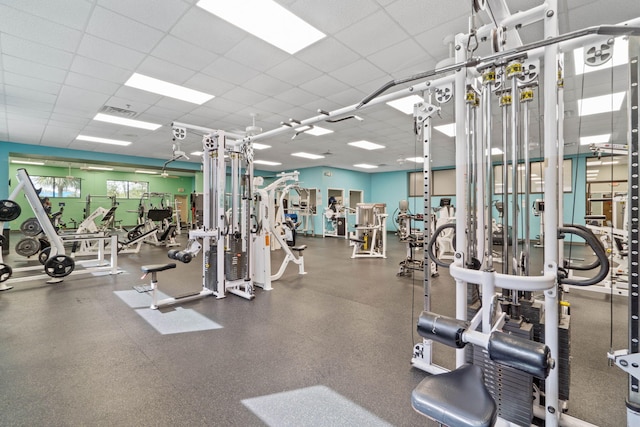 7478 Brevard St, Navarre, FL 32566 - gym featuring a paneled ceiling