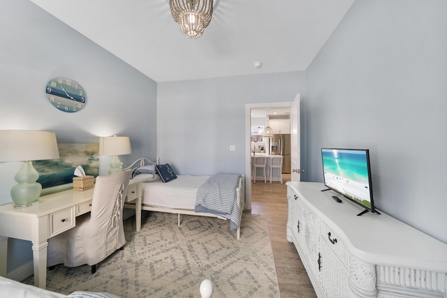 115 N Barcelona Ave, Santa Rosa Beach, FL 32459 - bedroom with wood finished floors and lofted ceiling