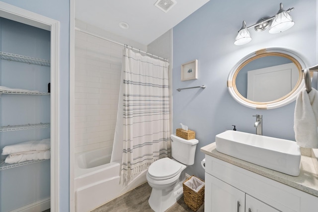115 N Barcelona Ave, Santa Rosa Beach, FL 32459 - full bathroom featuring vanity, shower / tub combo with curtain, and wood finished floors