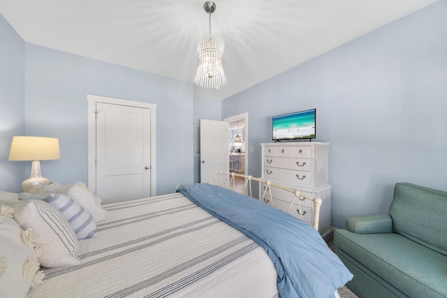 115 N Barcelona Ave, Santa Rosa Beach, FL 32459 - bedroom with a chandelier