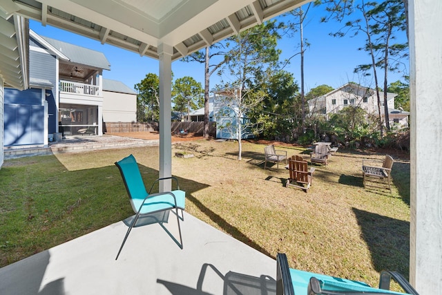 115 N Barcelona Ave, Santa Rosa Beach, FL 32459 - fenced backyard with a patio
