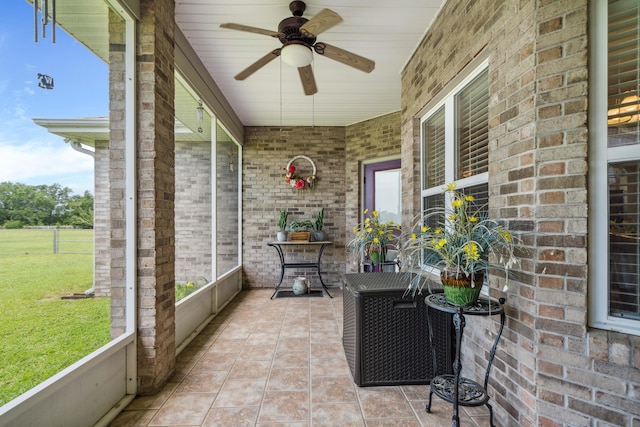 4820 Griffith Rd, Holt, FL 32564 - sunroom / solarium featuring a ceiling fan and plenty of natural light