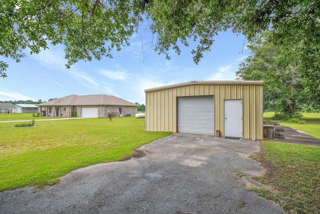 4820 Griffith Rd, Holt, FL 32564 - detached garage with asphalt driveway